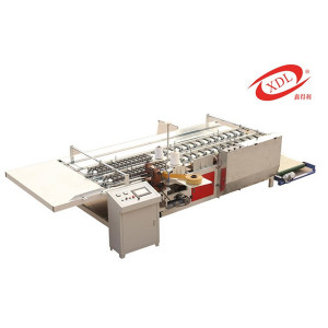 Heat shrink packaging machine