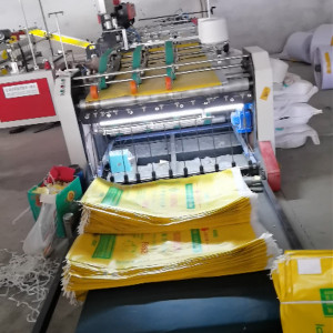 Woven bag machine